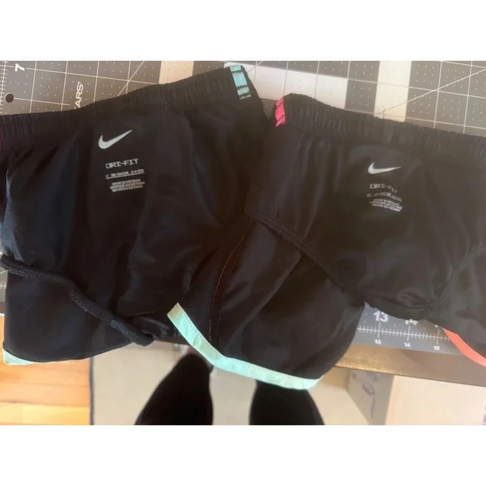 2 pair of Nike Toddler athletic shirts size 4T GUC